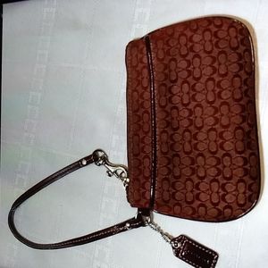 Coach signature Burgundy wine Jacquard and patent leather wristlet